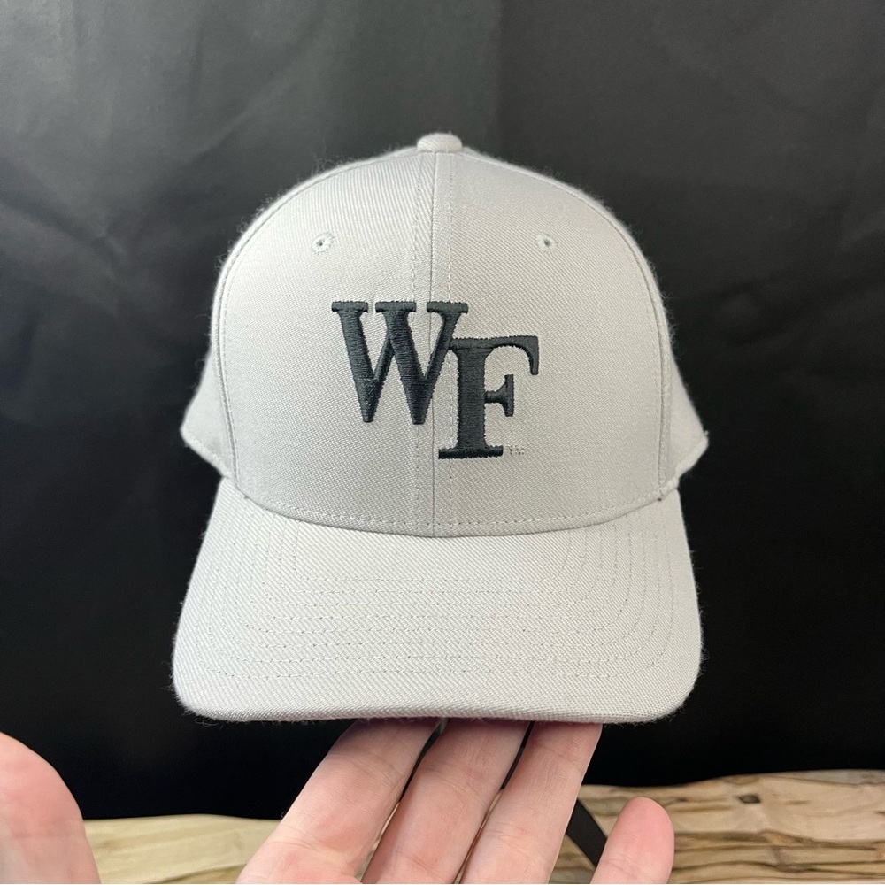 Wake Forest fitted Nike cap. Size says fits most. EUC pics of tag below.